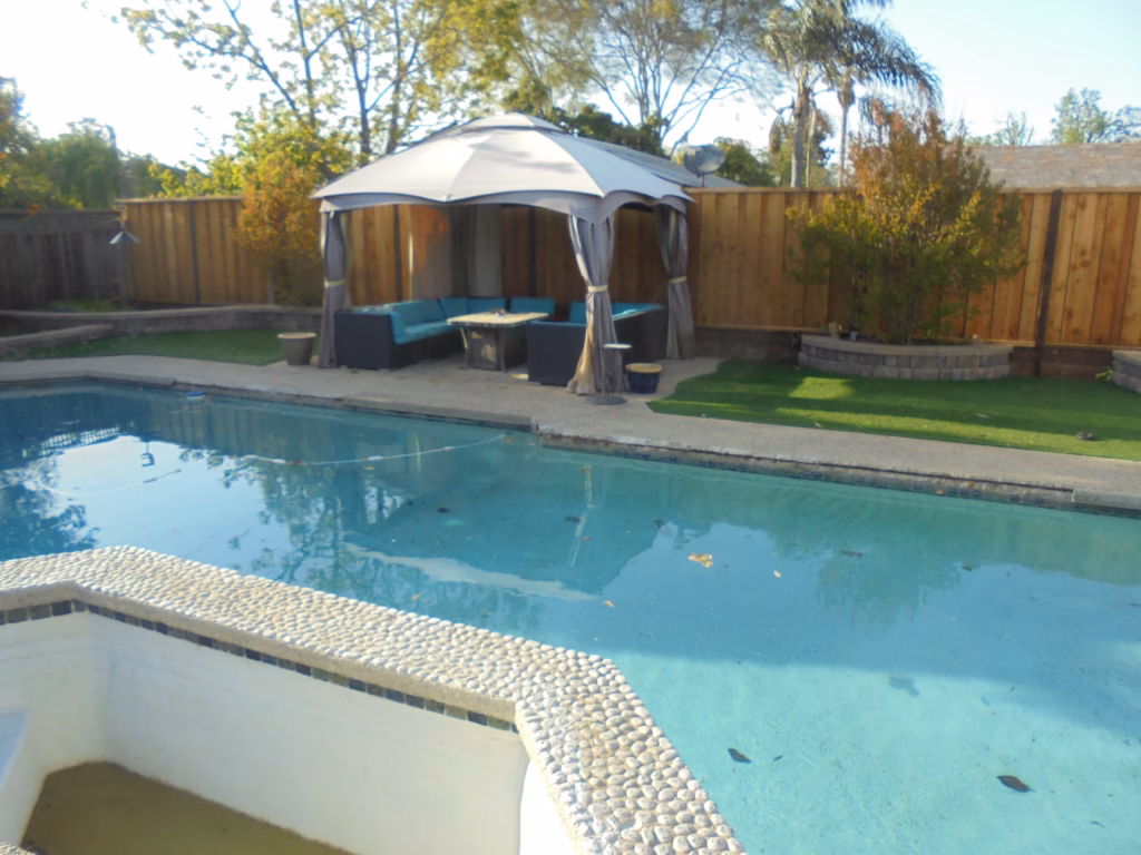 Before — pool and gazebo area