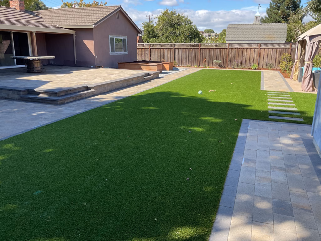 A San Jose Backyard Rebuilt Around Turf, Pavers, Planting, and Gathering Space