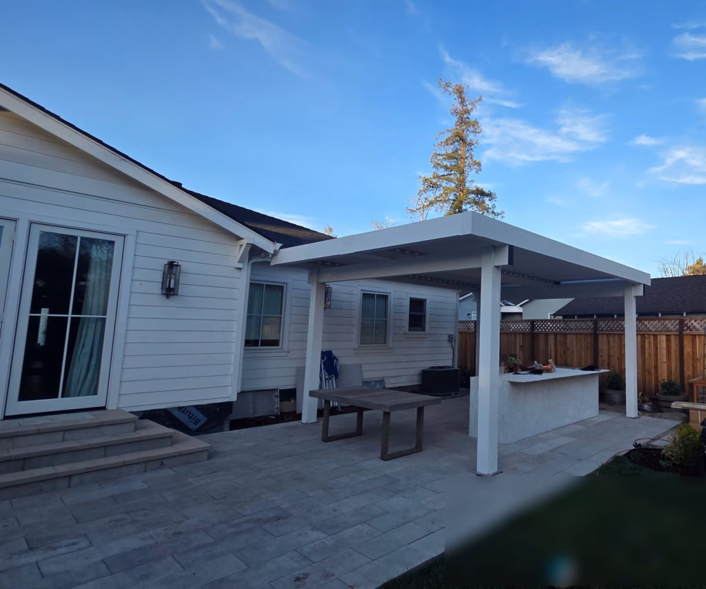 A Louvered Pergola, Paver Patio, and Outdoor Kitchen in Redwood Oaks