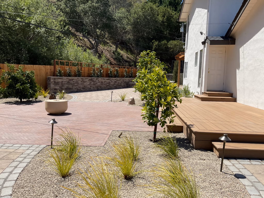 Hillside Paver Patio and Stone Outdoor Kitchen in San Bruno