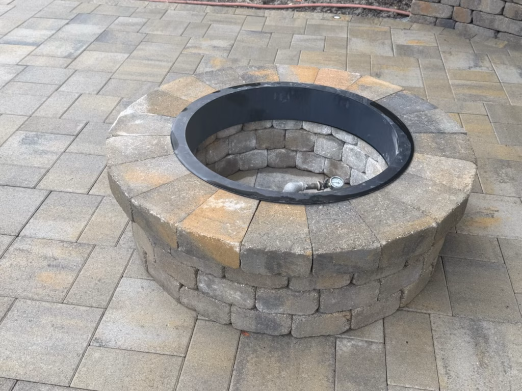 Before — the first tan block fire pit as originally built on the paver terrace in Atherton, CA