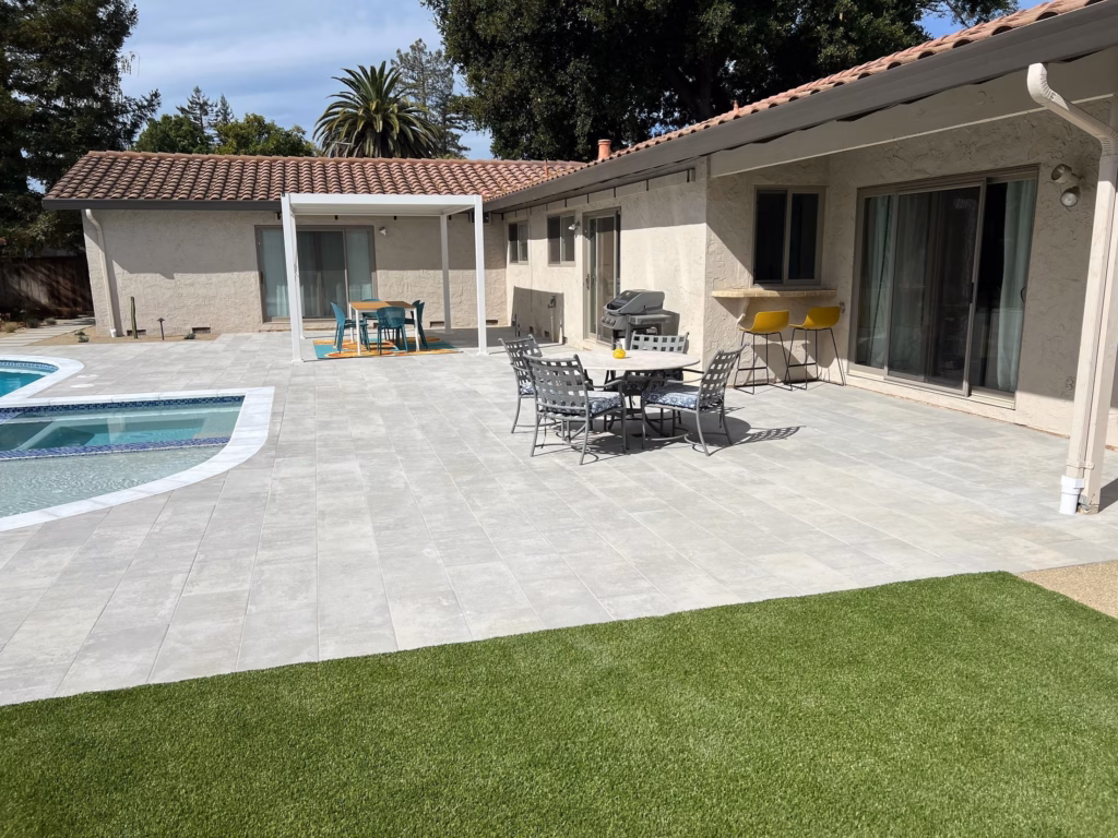 After — Belgard Dimensions paver terrace at the same kitchen window bar and patio cover in Los Altos, CA